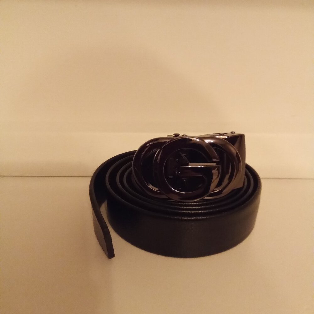 Black leather belt with buckle